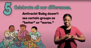 A young black woman with glasses signs in a short-sleeved red sweater top signs into camera next to an illustration of children playing together.